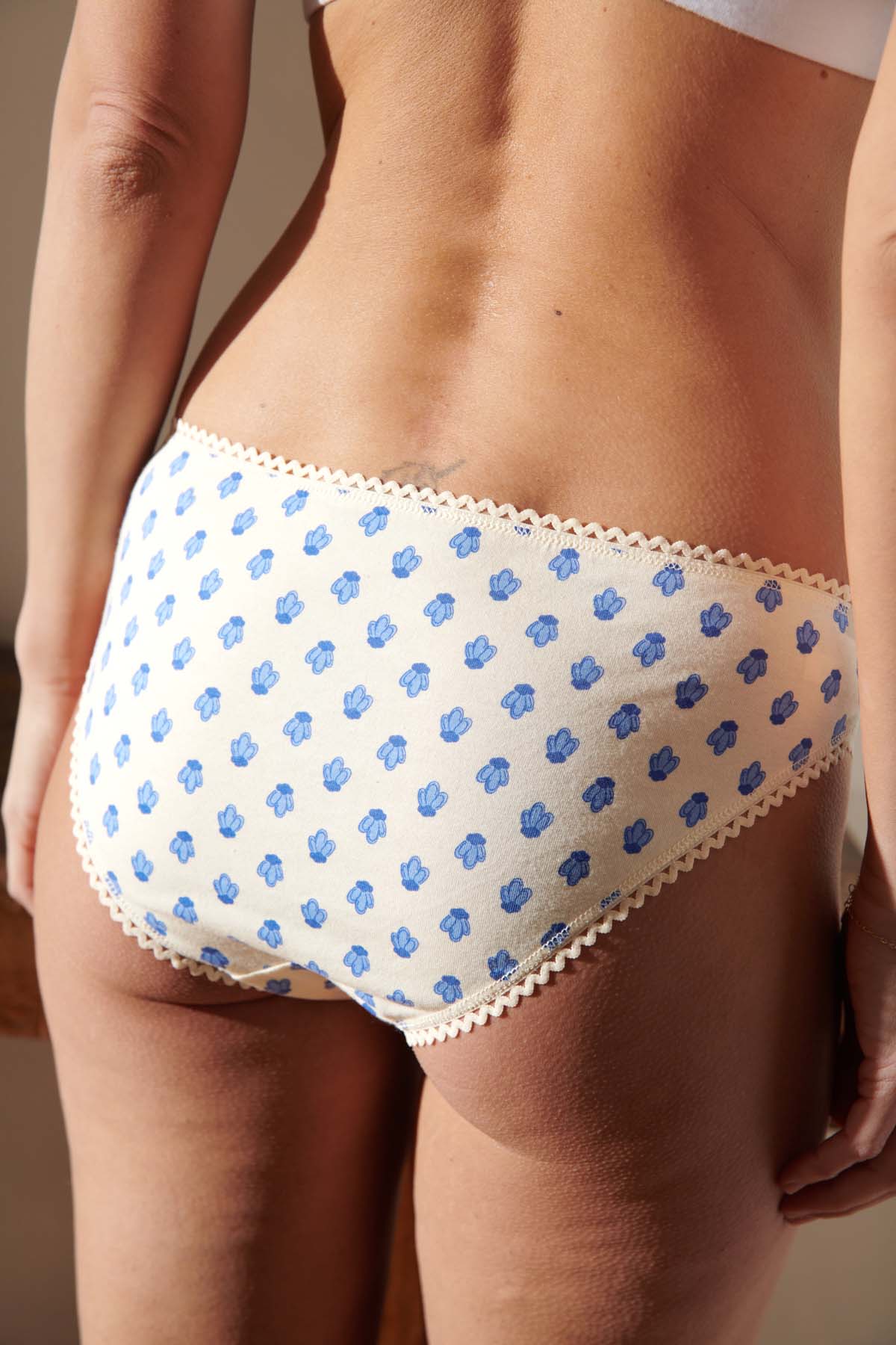 Kamila fait du 36 et porte une taille S*