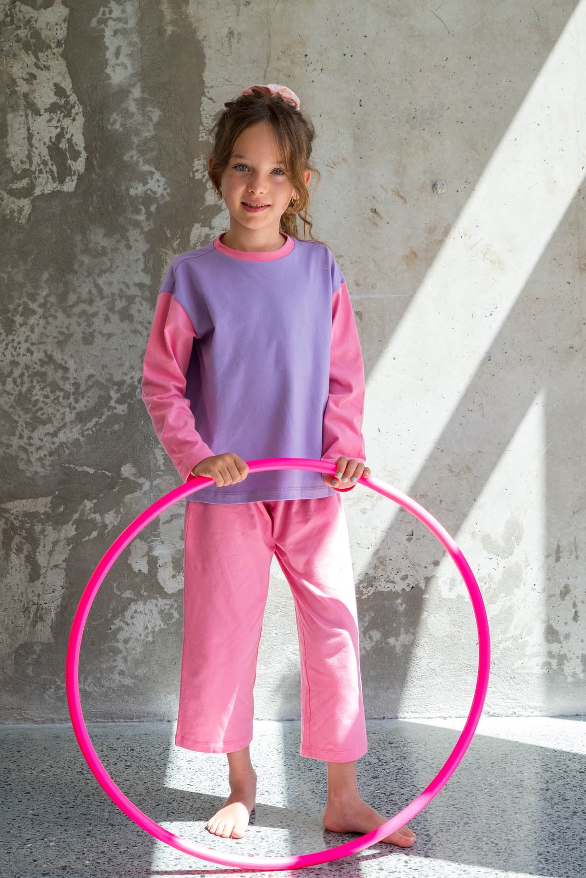 L. porte une taille 7/8 ans*