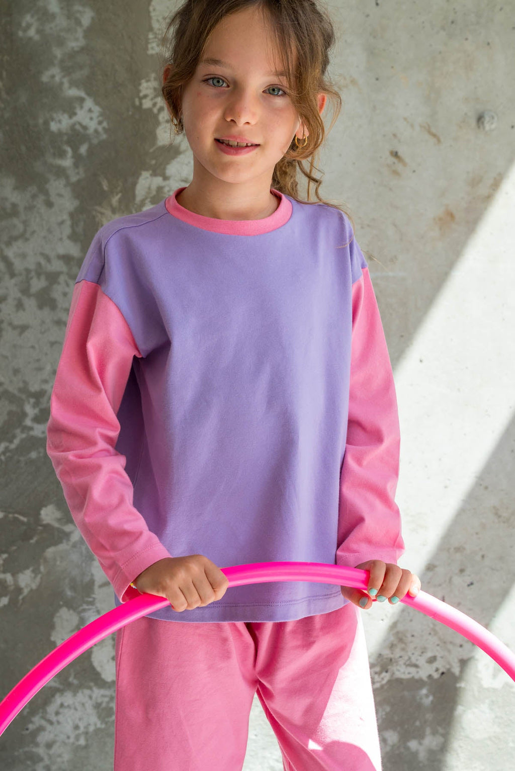 L. porte une taille 7/8 ans*
